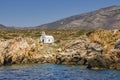 Scenic view of a typical Greek orthodox chapel located next to the sea in Paros island, Cyclades, Greece Royalty Free Stock Photo