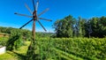 Ehrenhausen - Scenic view of vineyards and windmill klapotetz in Ehrenhausen an der Weinstrasse, Leibnitz Royalty Free Stock Photo