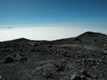 Scenic view of volcanic landscape against clear blue sky