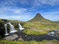 Scenic view of a waterfall in Kirkjufellfoss mountain in Iceland