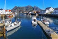 Scenic view of the waterfront harbor in Henningsvaer in summer. Royalty Free Stock Photo