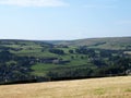 Scenic view of west yorkshire countryside with the village of luddenden at the bottom of the calder valley with buildings Royalty Free Stock Photo