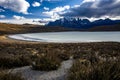 Scenic view of a white salty lagoon white salty in Chileanean desert against mountains