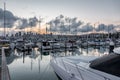 Scenic view of white yachts parked at Auckland Harbour Marina at sunrise, New Zealand