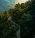 Scenic view of a winding road snaking its way down a mountain side, Lansdowne, Uttarakhand, India Royalty Free Stock Photo