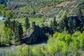 Scenic view of the Yakima River Valley with a chimney rock formation alongside the Yakima River, sunny spring day in Kittitas Coun