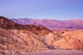 Scenic view from Zabriskie Point, showing convolutions, color contrasts, and texture in the eroded rock at dawn, Amargosa Range, Royalty Free Stock Photo