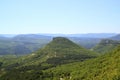 Scenic views of mountain landscape, rocks and valley in the summer.  Beautiful minimalist landscape of green mountain ranges Royalty Free Stock Photo