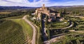 Scenic vineyards of Tuscany. Aerial drone view of medieval castle - Castello di Banfi.