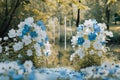 Scenic vows park setting, white and blue flowers, spring ambiance