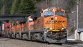 BNSF freight train passing Scenic in the Washington Cascades Royalty Free Stock Photo