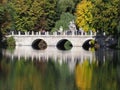 Scenic white bridge in baths park landscapes in Warsaw, european capital city of Poland in 2018 on September Royalty Free Stock Photo