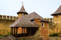 Scenic wide-angle view of courtyard with ancient stone buildings in the medieval castle Royalty Free Stock Photo