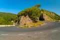Scenic winding road bend in Anaga mountain range anainst bright blue sky Tenerife, Spain. Royalty Free Stock Photo