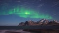 Scenic winter landscape with northern lights, Aurora borealis in night sky, Lofoten Islands, Norway