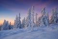 Scenic winter sunrise in mountains with pink sky Royalty Free Stock Photo