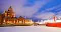 Scenic winter view the frozen Old Port in Katajanokka district with Uspenski Orthodox Cathedral in Helsinki Finland