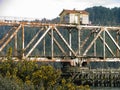 Scenic woodland, river landscape with old railroad bridge