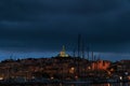 A scenics view of the city of Marseille, bouches-du-rhone, France at night with the old port i Royalty Free Stock Photo