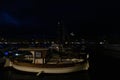 A scenics view of the old port of Marseille, bouches-du-rhone, France at night with boats and the illuminated basilique notre- Royalty Free Stock Photo