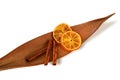 Scented cinnamon sticks and orange slices, isolate