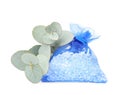 Scented sachet with aroma beads and eucalyptus branches on white background