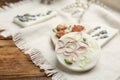 Scented sachets on wooden table, closeup. Space for text