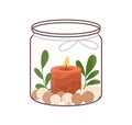 Scented wax candle in glass jar. Modern aromatic decoration with leaf, stones. Natural cozy decorative burning