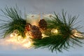 Scented wax candles, cedar cones, cedar branch, Christmas garland, composition Royalty Free Stock Photo