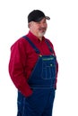 Sceptical man on overalls with a dubious look Royalty Free Stock Photo