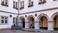 Two photographers capture the spitting boy Schangelbrunnen fountain in Koblenz.