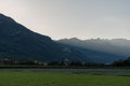 Schaan, Liechtenstein, September 25, 2021 Sun rays behind the mountains in autumn