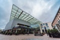 Schaerbeek, Brussels - Belgium - Inner court and glass overhang of the docks bruxsel shopping mall during a rainy day