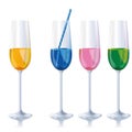 Four narrow different colored champagne glasses with drinking straw Royalty Free Stock Photo