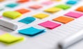 A scheduler marked with vibrant sticky notes helps organize appointments, tasks, and deadlines, improving planning. Royalty Free Stock Photo