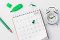 Scheduling and planning concept, pinned date on calendar 2023 with stationery Royalty Free Stock Photo