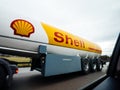 Schell large inscription and logotype on the petrol truck tanker driving fast on Royalty Free Stock Photo