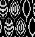Scheme for knitting. Seamless geometric pattern with decorative leaves. Vector graphic texture.