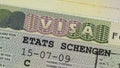 Schengen visa in the passport close-up. Royalty Free Stock Photo