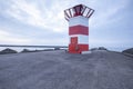 Scheveningen, Februari 18 2019: Scheveningen, The Hague, The Netherlands.Lighthouse at sunset, blue sky with copy space