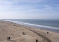 Scheveningen, Februari 18 2019: Scheveningen, The Hague, The Netherlands. Seaside landscape, view of the beach, people Royalty Free Stock Photo