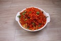 Schezwan fried rice with Schazwan sauce, Chinese fried rice, garnished with spring onions and cabbage. Indian-Chinese dishes;