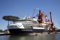 Ship Saipem Constellation docked at Huisman Equipment in Schiedam for maintenance and the water taxi passing by.