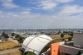 View of sailboats docked at the pier viewed from University of Kiel Sailing Center in summer with clouds in blue sky background. Royalty Free Stock Photo