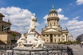 Schiller monument and French church dome on Gendarmenmarkt square, Berlin, Germany