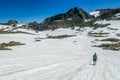 Schladming - A girl hiking through a snowy plateau Royalty Free Stock Photo