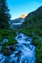 Schladming - A small stream in an alpine valley captured during the sunrise