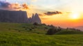 Schlern mountain with pasture at sunset, South Tyrol, Italy Royalty Free Stock Photo