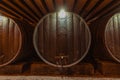 Schnapps or wine barrels in wood. Wine cellar or something simil Royalty Free Stock Photo