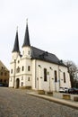 Schneeberg, Germany - March 26, 2024: View of Hospital Church of St. Trinity in Schneeberg, a historical mining town in the Ore